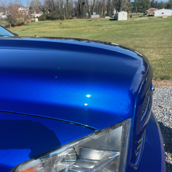 The front of a truck that has been detailed and received a ceramic coating. | Mystic AC Detailing