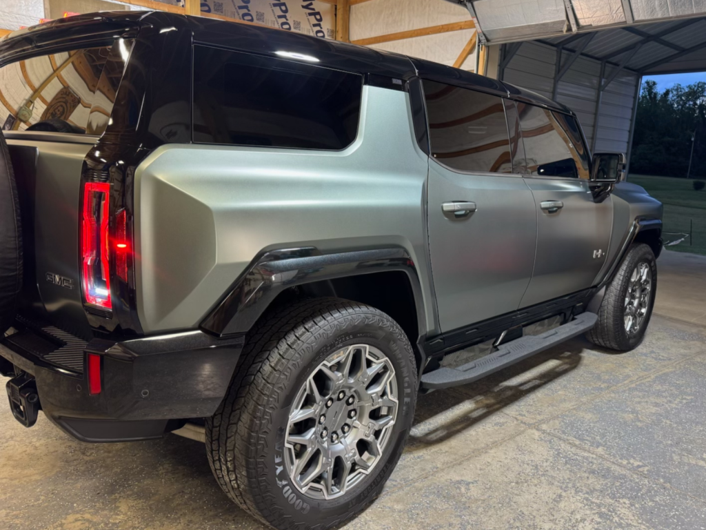 A Hummer that has been detailed and is sitting in a garage. Mystic AC Detailing