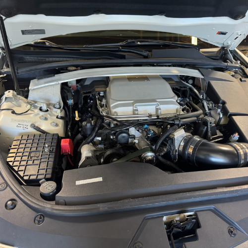 A sports car engine that has been detailed - Engine Cleaning Services | Mystic AC Detailing
